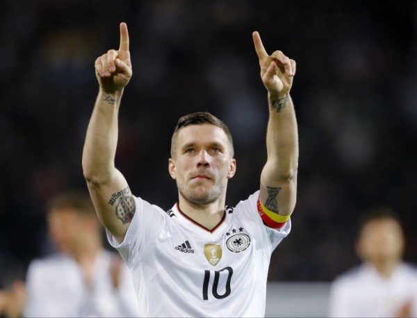 Podolski ends international career in style as he captained Germany to ...